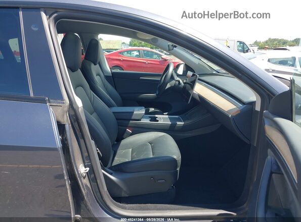 7SAYGDEE4PA098911 2023 TESLA MODEL Y Gray Widok wnętrza z przodu