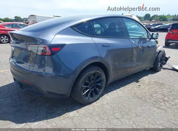 7SAYGDEE4PA098911 2023 TESLA MODEL Y Gray Tył prawy