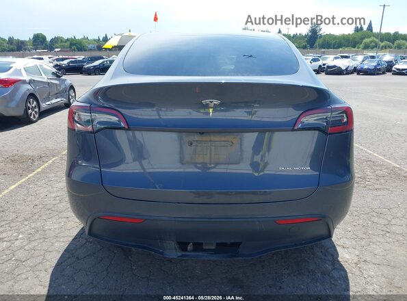 7SAYGDEE4PA098911 2023 TESLA MODEL Y Gray 