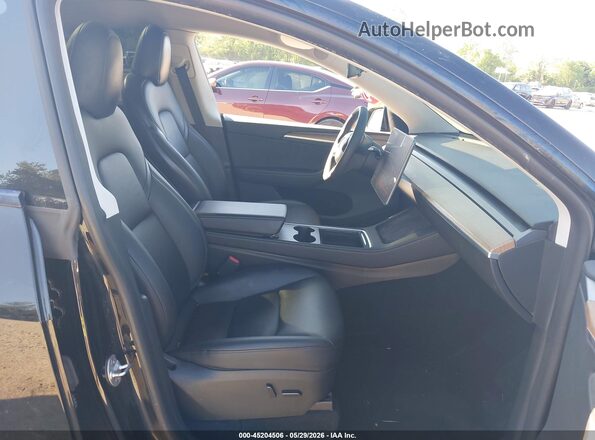 7SAYGDEE4PA118705 2023 TESLA MODEL Y Black Front interior view