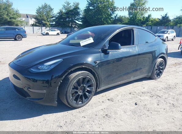 7SAYGDEE4PA118705 2023 TESLA MODEL Y Black Front left