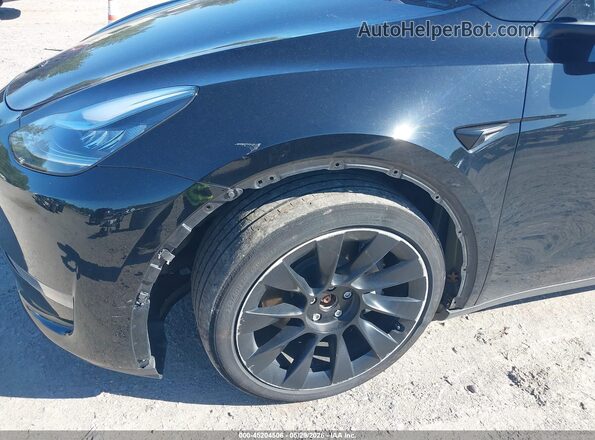7SAYGDEE4PA118705 2023 TESLA MODEL Y Black Front view