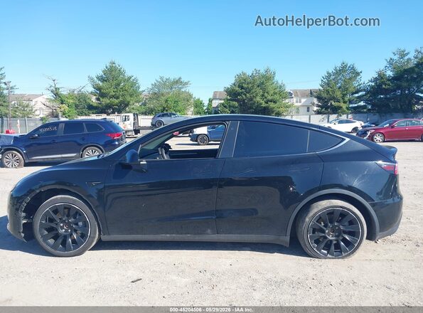 7SAYGDEE4PA118705 2023 TESLA MODEL Y Black 