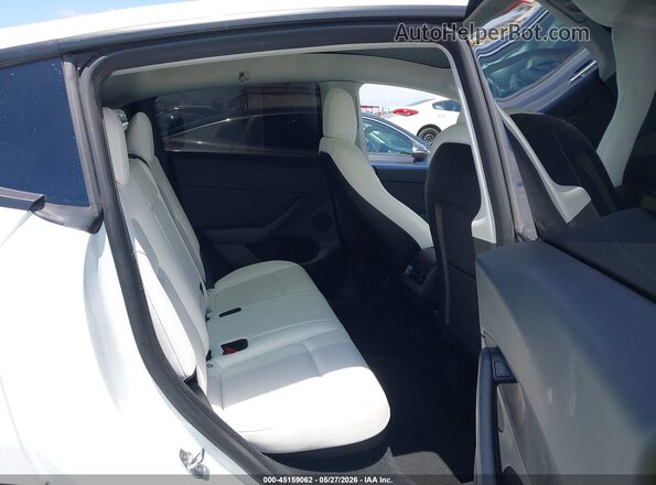 7SAYGDEE4PF630113 2023 TESLA MODEL Y White VIN կոդի պիտակի տեսք