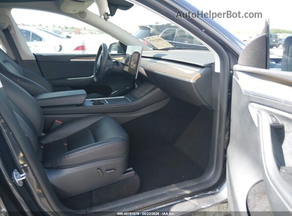 7SAYGDEE4RA302562 2024 TESLA MODEL Y Gray Вид салону спереду