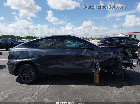 7SAYGDEE4RA302562 2024 TESLA MODEL Y Gray Вид задньої частини салону