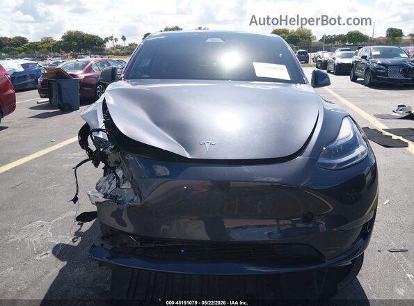 7SAYGDEE4RA302562 2024 TESLA MODEL Y Gray Вид щитка приладів