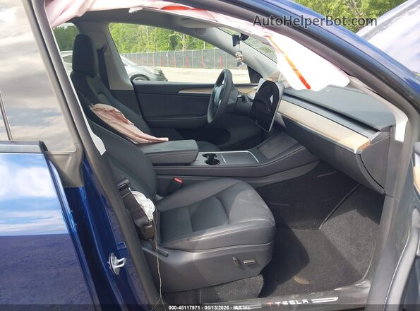 7SAYGDEE4SA346938 2025 TESLA MODEL Y Blue Widok wnętrza z przodu