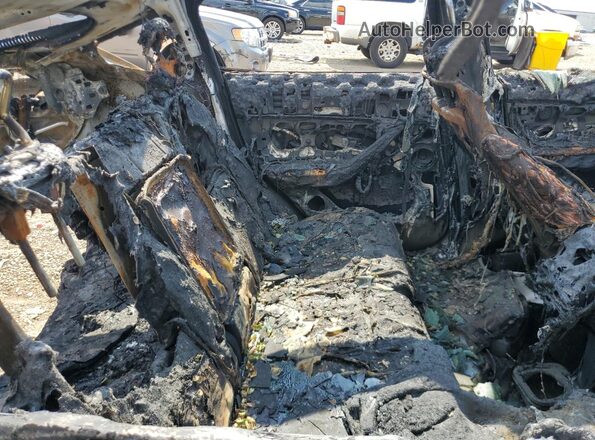 7SAYGDEE4SF254635 2025 TESLA MODEL Charcoal Widok wnętrza z tyłu