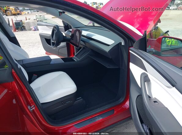 7SAYGDEE4TA387961 2026 TESLA MODEL Y Темно-бордовый Вид салона спереди