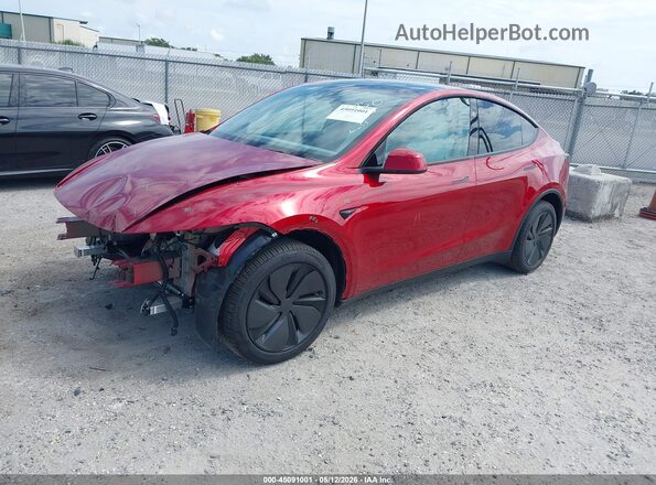 7SAYGDEE4TA387961 2026 TESLA MODEL Y Темно-бордовый Передняя левая четверть
