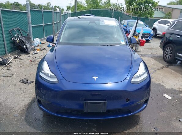 7SAYGDEE6PA062038 2023 TESLA MODEL Y Blue Rear interior view