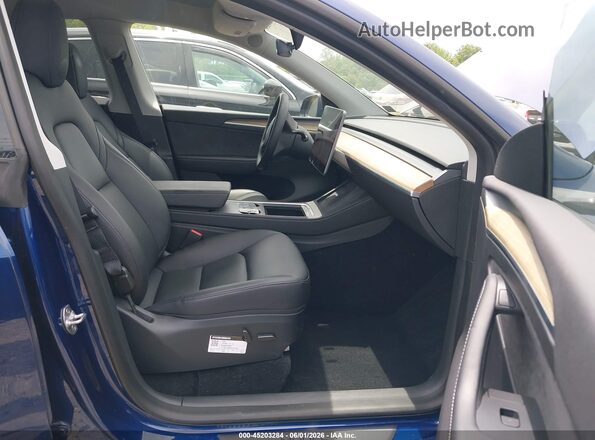 7SAYGDEE6PA062038 2023 TESLA MODEL Y Blue Front interior view