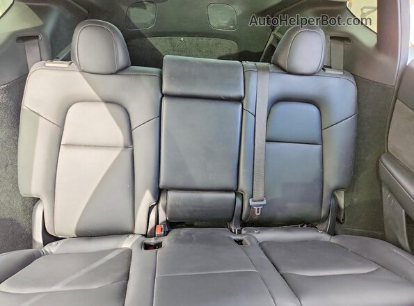 7SAYGDEE6RA291855 2024 TESLA MODEL White Rear seats view