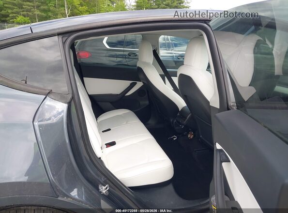 7SAYGDEE7NF372733 2022 TESLA MODEL Y Black VIN կոդի պիտակի տեսք