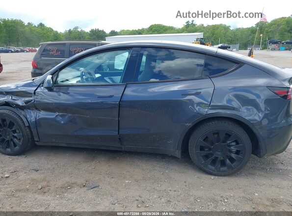7SAYGDEE7NF372733 2022 TESLA MODEL Y Black Սալոնի հետևի տեսք