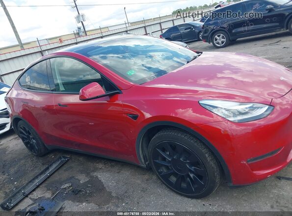 7SAYGDEE7PA129682 2023 TESLA MODEL Y Red ხელსაწყოთა პანელის ხედი