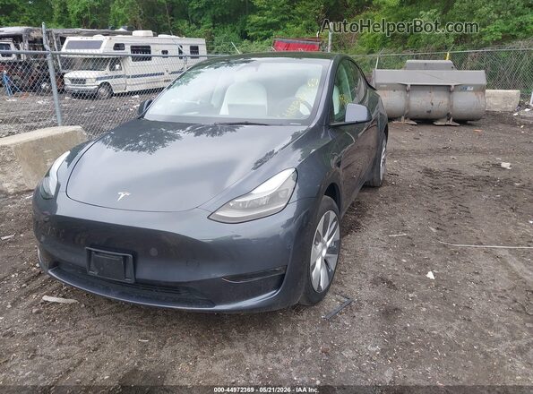 7SAYGDEE7PA206602 2023 TESLA MODEL Y Gray Vista tres cuartos delantera izquierda