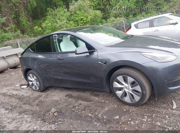 7SAYGDEE7PA206602 2023 TESLA MODEL Y Gray Vista interior trasera