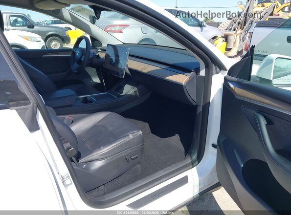 7SAYGDEE7PF740511 2023 TESLA MODEL Y Белый Вид салона спереди
