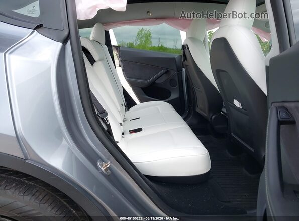 7SAYGDEE7RA314074 2024 TESLA MODEL Y Blue Vista de la etiqueta del VIN