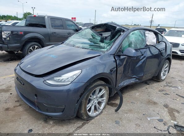 7SAYGDEE8NF327557 2022 TESLA MODEL Y Gray Առջևի ձախ երեք քառորդ տեսարան