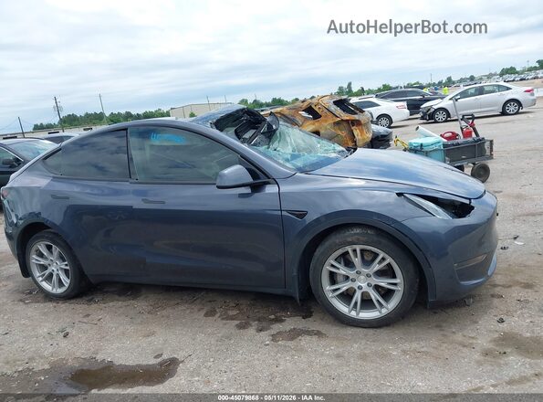 7SAYGDEE8NF327557 2022 TESLA MODEL Y Gray Սալոնի հետևի տեսք