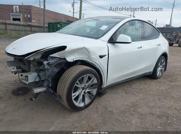 7SAYGDEE8PF773145 2023 TESLA MODEL Y White Vista tres cuartos delantera izquierda