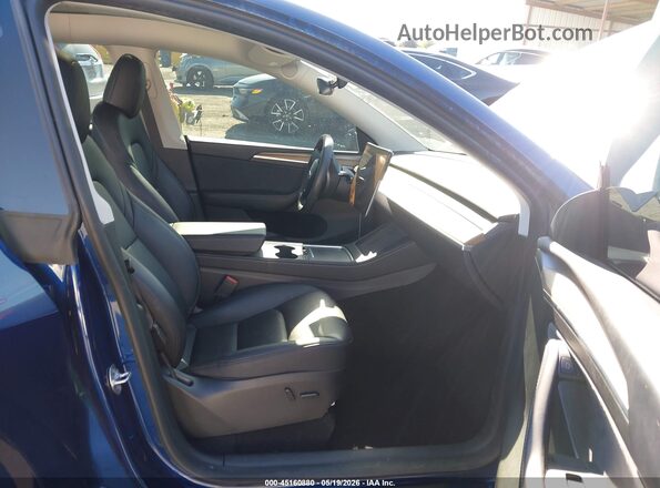 7SAYGDEE8PF807570 2023 TESLA MODEL Y Blue Вид салону спереду