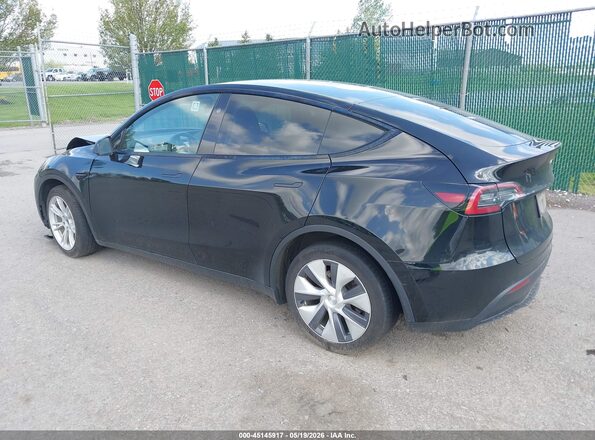 7SAYGDEE8PF949207 2023 TESLA MODEL Y Black Trasero izquierdo