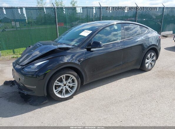 7SAYGDEE8PF949207 2023 TESLA MODEL Y Black Vista tres cuartos delantera izquierda