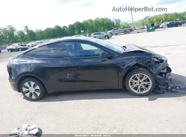 7SAYGDEE8PF949207 2023 TESLA MODEL Y Black Vista interior trasera