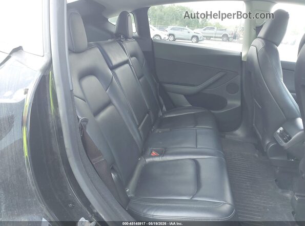 7SAYGDEE8PF949207 2023 TESLA MODEL Y Black Vista de la etiqueta del VIN