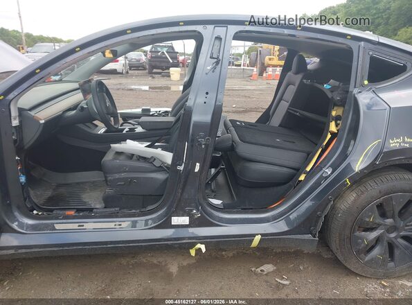7SAYGDEE8RA296281 2024 TESLA MODEL Y Gray Vista frontal