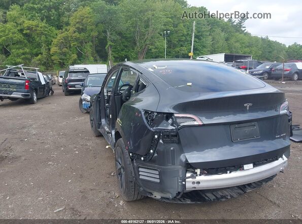 7SAYGDEE8RA296281 2024 TESLA MODEL Y Gray Trasero izquierdo