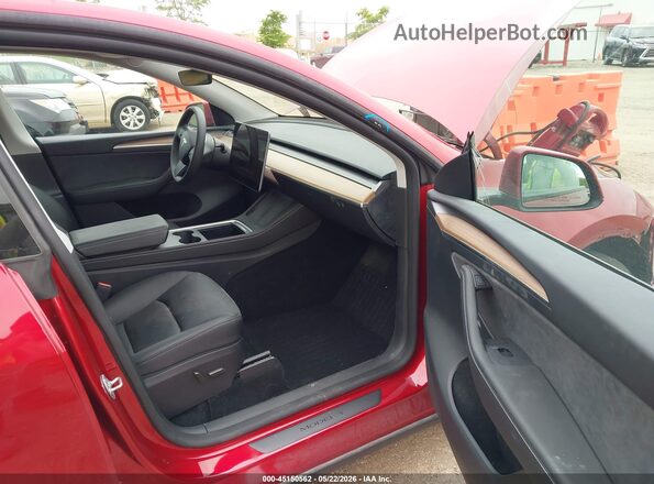 7SAYGDEE8SF280669 2025 TESLA MODEL Y Red Вид салону спереду