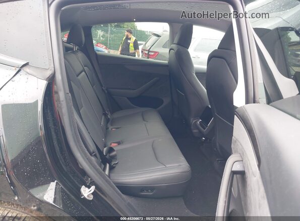 7SAYGDEE8TA594224 2026 TESLA MODEL Y Black VIN კოდის სტიკერის ხედი