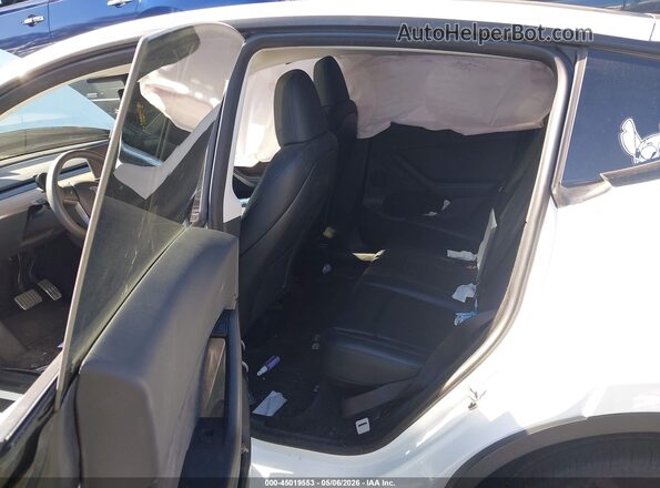 7SAYGDEE9PA034752 2023 TESLA MODEL Y White VIN կոդի պիտակի տեսք