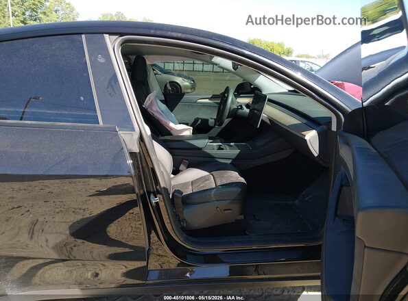 7SAYGDEE9PA183047 2023 TESLA MODEL Y Black Front interior view