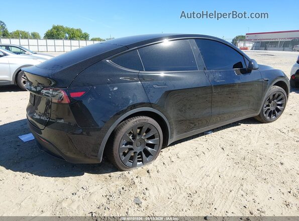 7SAYGDEE9PA183047 2023 TESLA MODEL Y Black Rear right