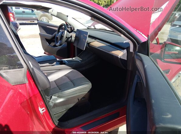 7SAYGDEE9PF613033 2023 TESLA MODEL Y Red Вид салону спереду