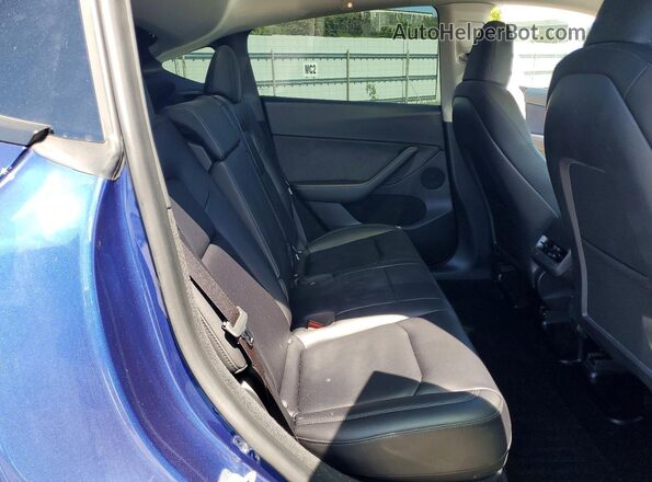7SAYGDEE9PF748576 2023 TESLA MODEL Blue Vista de los asientos traseros