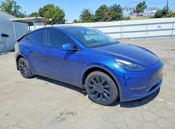 7SAYGDEE9PF748576 2023 TESLA MODEL Blue Delantero derecho