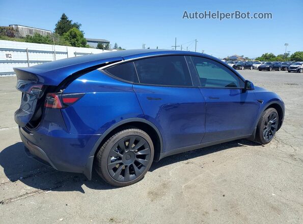7SAYGDEE9PF748576 2023 TESLA MODEL Blue Trasero derecho
