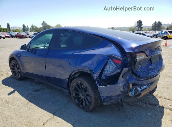 7SAYGDEE9PF748576 2023 TESLA MODEL Blue Trasero izquierdo