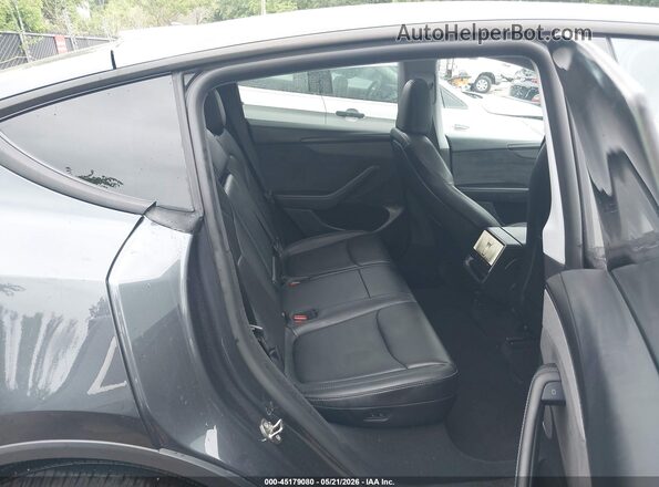 7SAYGDEE9TA390998 2026 TESLA MODEL Y Black Widok tylnych siedzeń