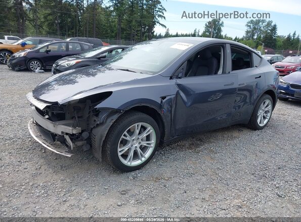 7SAYGDEEXPA157041 2023 TESLA MODEL Y Gray Przód lewy