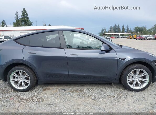7SAYGDEEXPA157041 2023 TESLA MODEL Y Gray Widok wnętrza 360 stopni