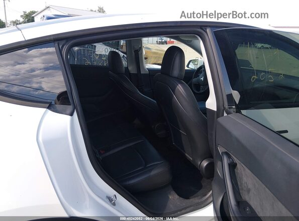 7SAYGDEF0NF308168 2022 TESLA MODEL Y White VIN sticker view