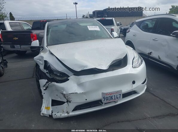 7SAYGDEF0NF406598 2022 TESLA MODEL Y White Սարքավորումների վահանակի տեսք